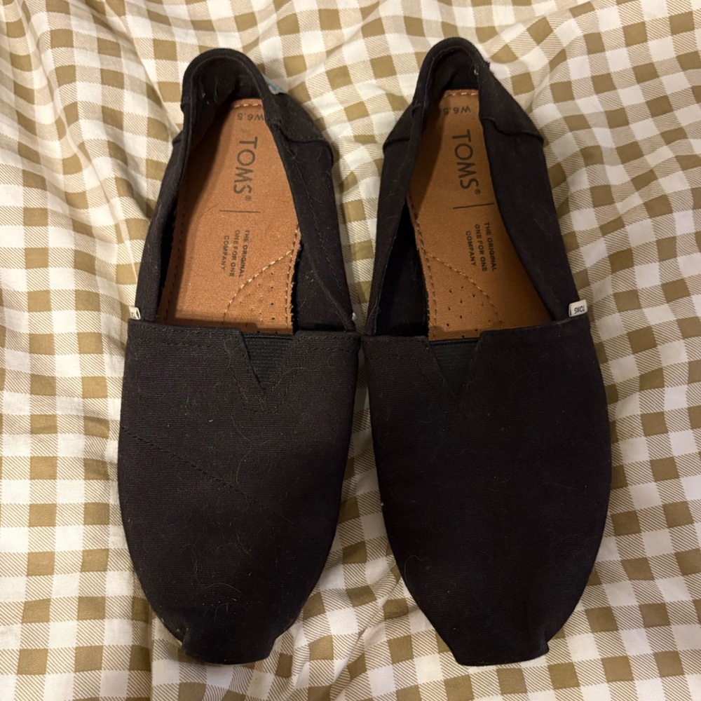 TOMS Black Canvas Slip-Ons